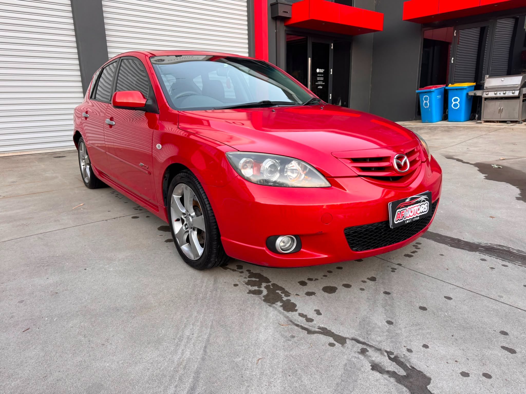 2005 Mazda 3 SP23 Hatchback/Liftback/Notchback Petrol Automatic red for sale at Fathi co PTY LTD image 1